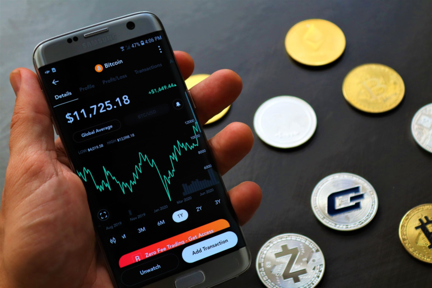 Smartphone showing cryptocurrency trading interface — digital finance and investment