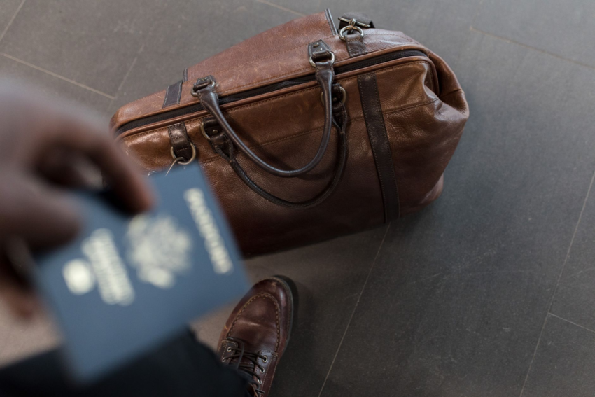 Passport and travel essentials for moving abroad