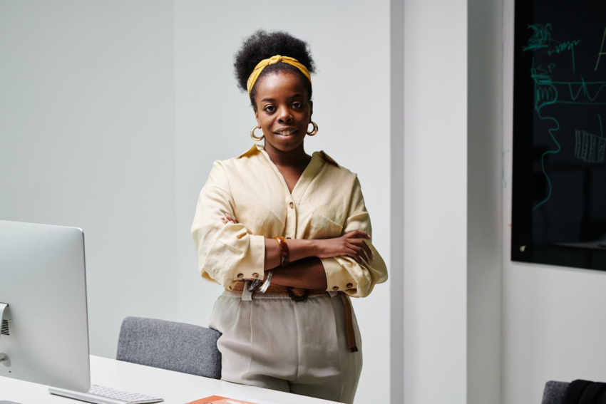 Confident Black businesswoman in a modern office - Universal Day 8, Power & Abundance | September 7, 2026