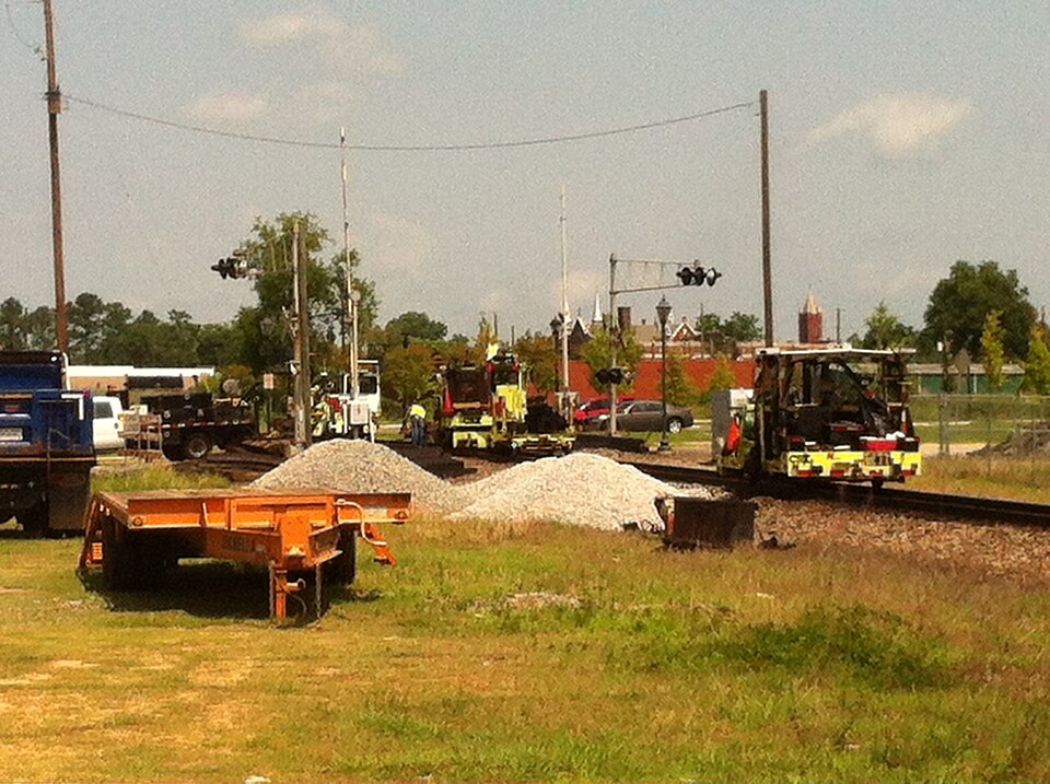 Street-level photo: Augusta, Georgia June 2013 CSX Maintenance of Way Crews working on road crossing.