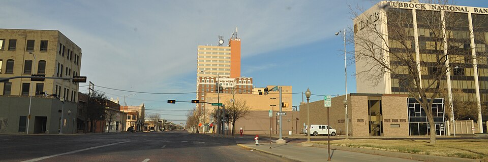 Street-level photo: Looking east on Broadway Street in downtown Lubbock, Texas with the Metro Tower right of center.